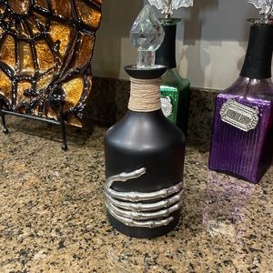 Skeleton Hand Decanter by Cynthia Rowley